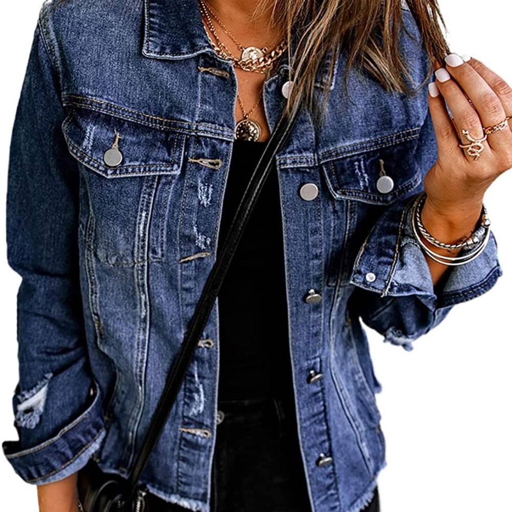 Jean jacket (oversized). Distressed.
